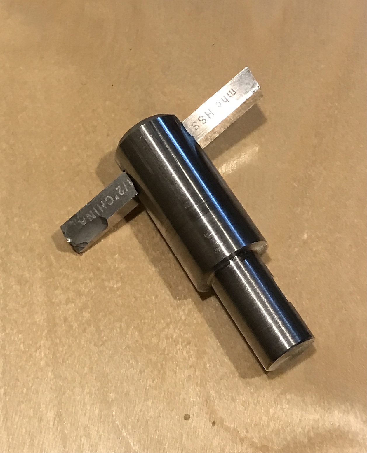 A tool bit driven through the holder